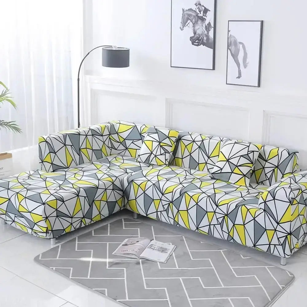 L-shaped sofa covered with decorbites geometric stretch sofa cover featuring yellow gray and white triangle pattern