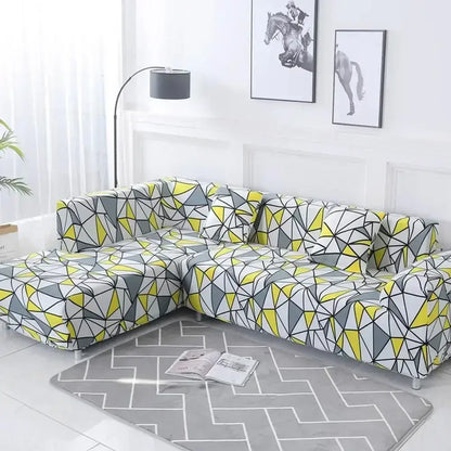 L-shaped sofa covered with decorbites geometric stretch sofa cover featuring yellow gray and white triangle pattern