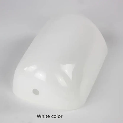 White glossy plastic cap with rounded rectangular shape and small hole on side for decorbites glass banker lamp shade