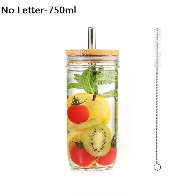 Clear glass decorbites glass boba smoothie cup with bamboo lid and stainless steel straw filled with fresh fruit slices