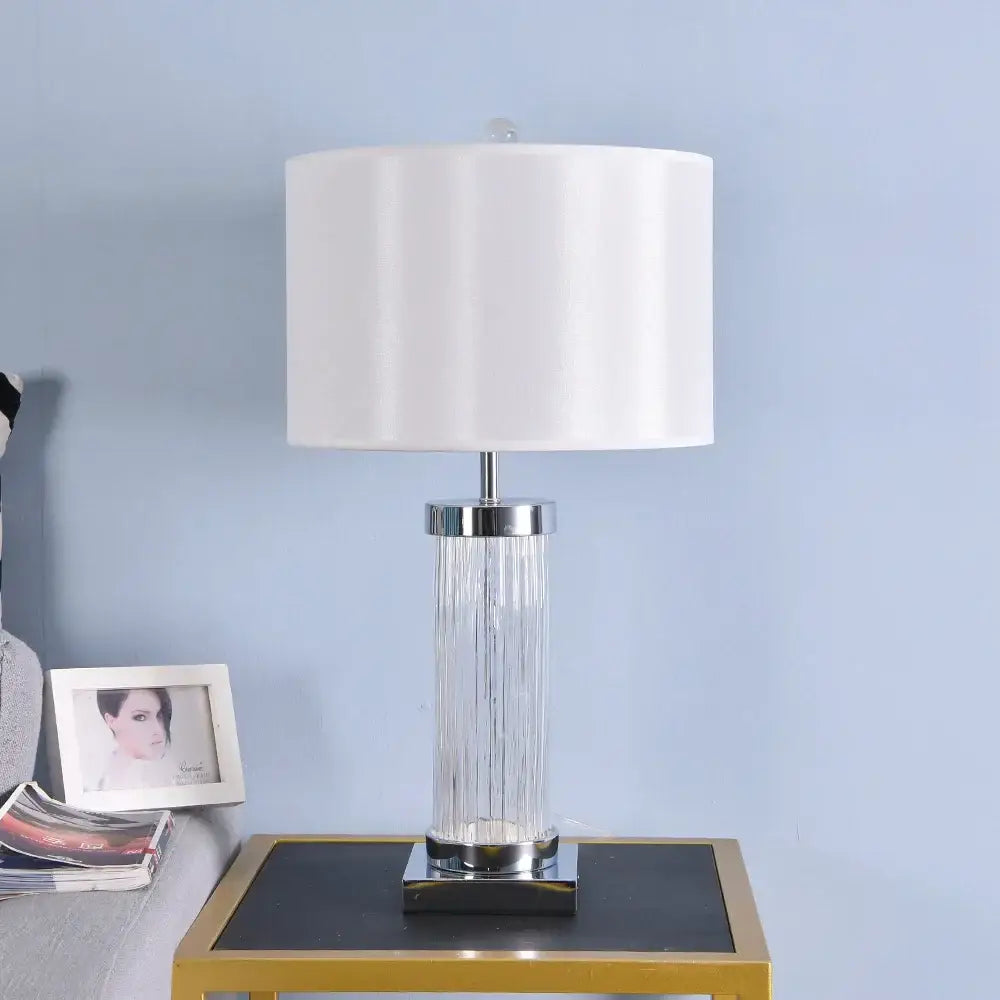 Glass crystal cylinder table lamp with clear ribbed glass base and white cream shade for bedroom use