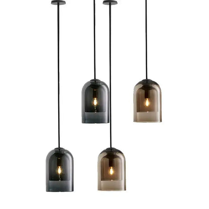 Set of four modern glass led chandelier pendant lights with smoked glass bell shades and black cords for dining room
