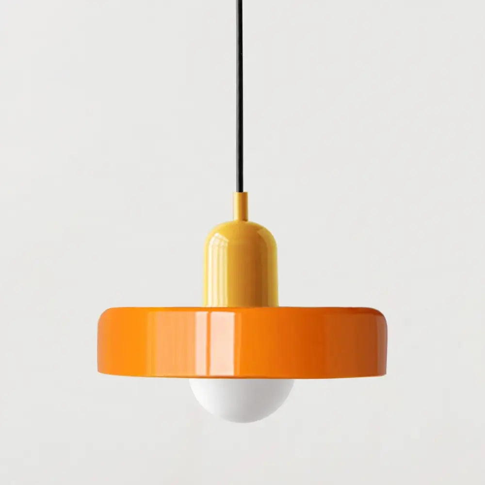 Vibrant orange and yellow glass pendant lighting with a sleek modern bauhaus style design for interior use