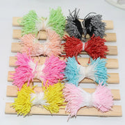 Colorful glitter pom pom mini flower stamen hair ties in green black red pink blue yellow and white for kids bedroom