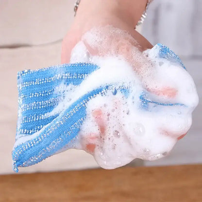 Blue textured sponge with striped pattern and white suds from decorbites kitchen cleaning set scrubbers