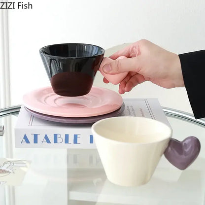 Glossy black porcelain lovers mug with a wide flared rim in a heart shape lovers mug set for dining room use