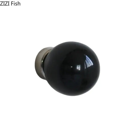 Glossy black ceramic wall hook clothing rack with spherical knob and metallic base for bedroom use