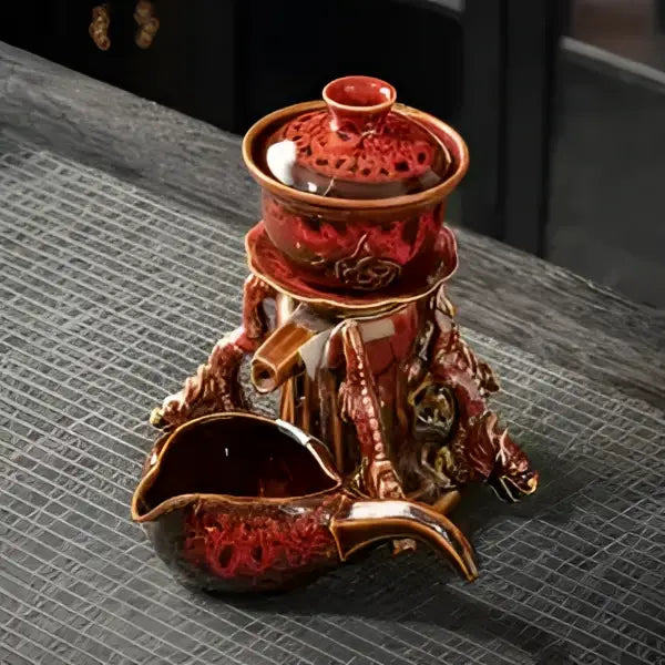 Red ceramic magnetic rotating tea set with gold-toned dragon motifs and matching lid decorbites dragon teapot