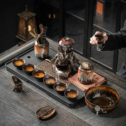 Dark ceramic magnetic rotating tea set with glossy earth tone glaze and decorbites dragon teapot patterns