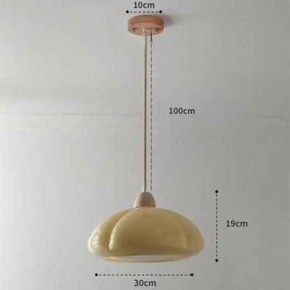 Beige ceramic pendant light with fluted dome shade and wooden mount ideal for bedroom lighting or restaurant balcony
