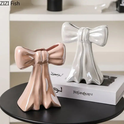 Two glossy ceramic bowknot vases in blush pink and white for bedroom decor by decorbites bowknot ceramic