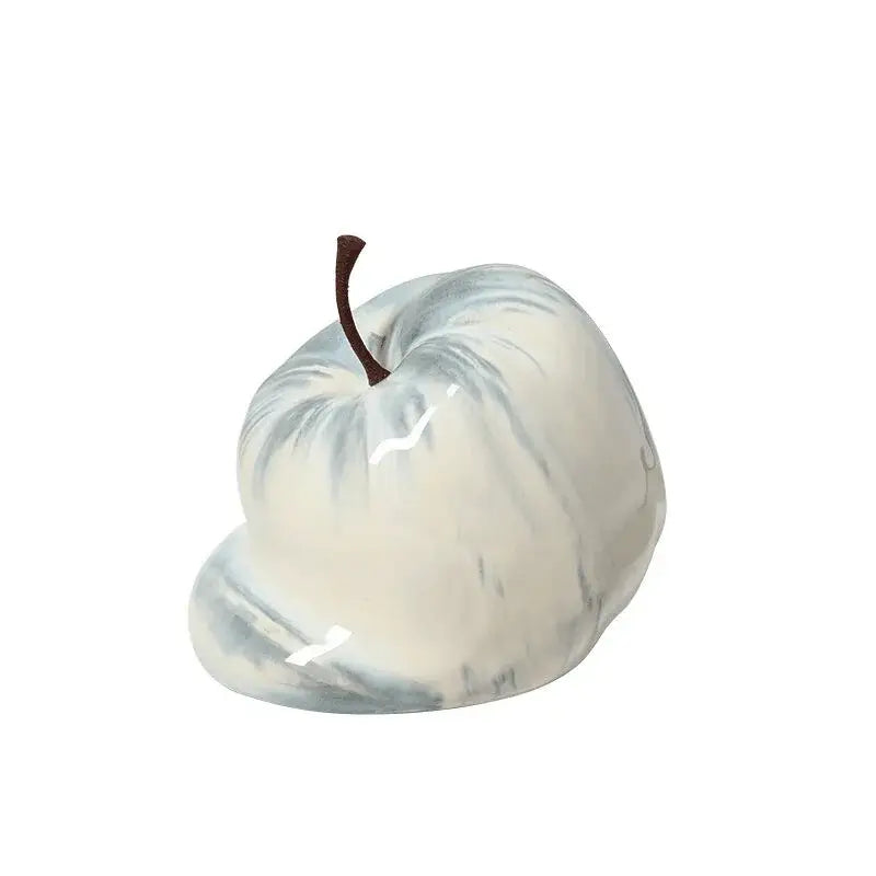 Glossy white ceramic abstract melting apple with gray marbling and dark brown stem for decorbites living room decor