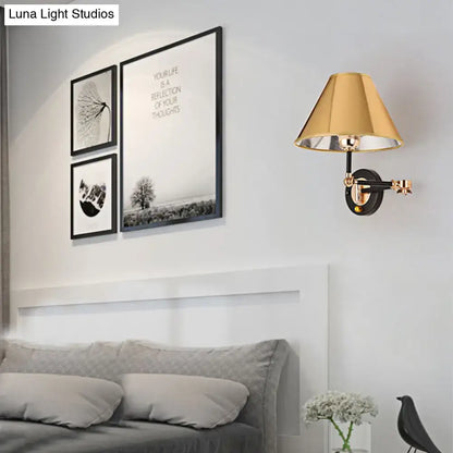 Gold and black metal cone wall light swing arm bedroom sconce with gold-toned adjustable cone shade and black mounting base