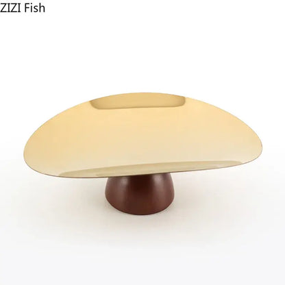 Gold and dark wood cake stand fruit bowl tray set with a sleek curved design and polished metallic top