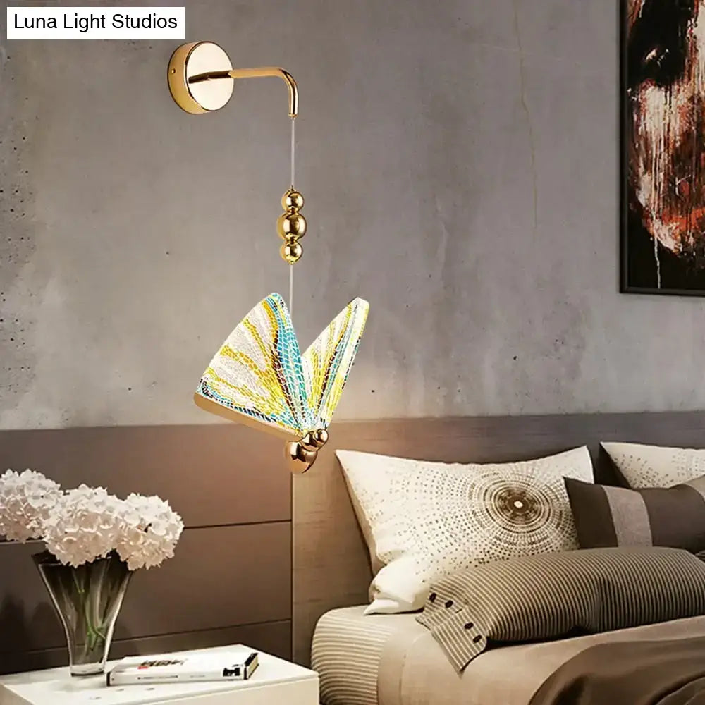 Gold-toned wall light with a colorful butterfly led mosaic glass shade for nordic butterfly led bedroom decor