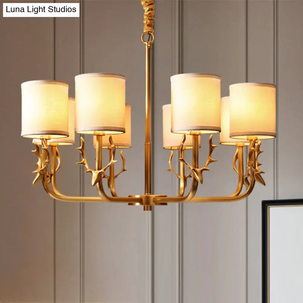 Gold-toned antler deco chandelier with cream fabric shade cylindrical lamps suitable for led incandescent fluorescent bulbs