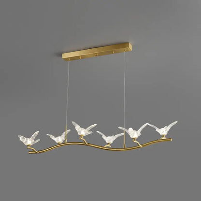 Gold bird branch led pendant lamp with five clear crystal bird fixtures on gold-toned branch and adjustable chain cord length
