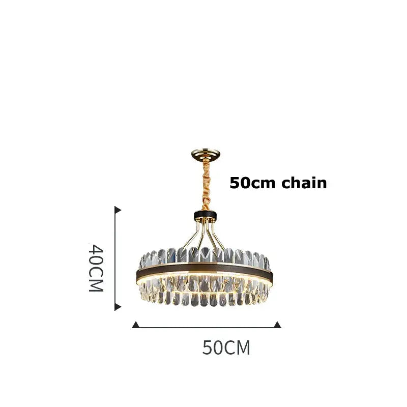 Gold and black decorbites crystal oval chandelier with a gold metal frame and clear crystal droplets for dining room decor
