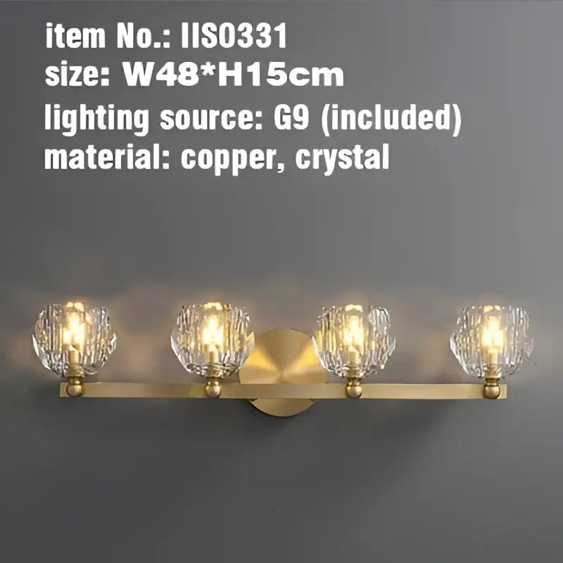 Gold brass vanity light fixtures with four faceted crystal globe shades for bathroom use