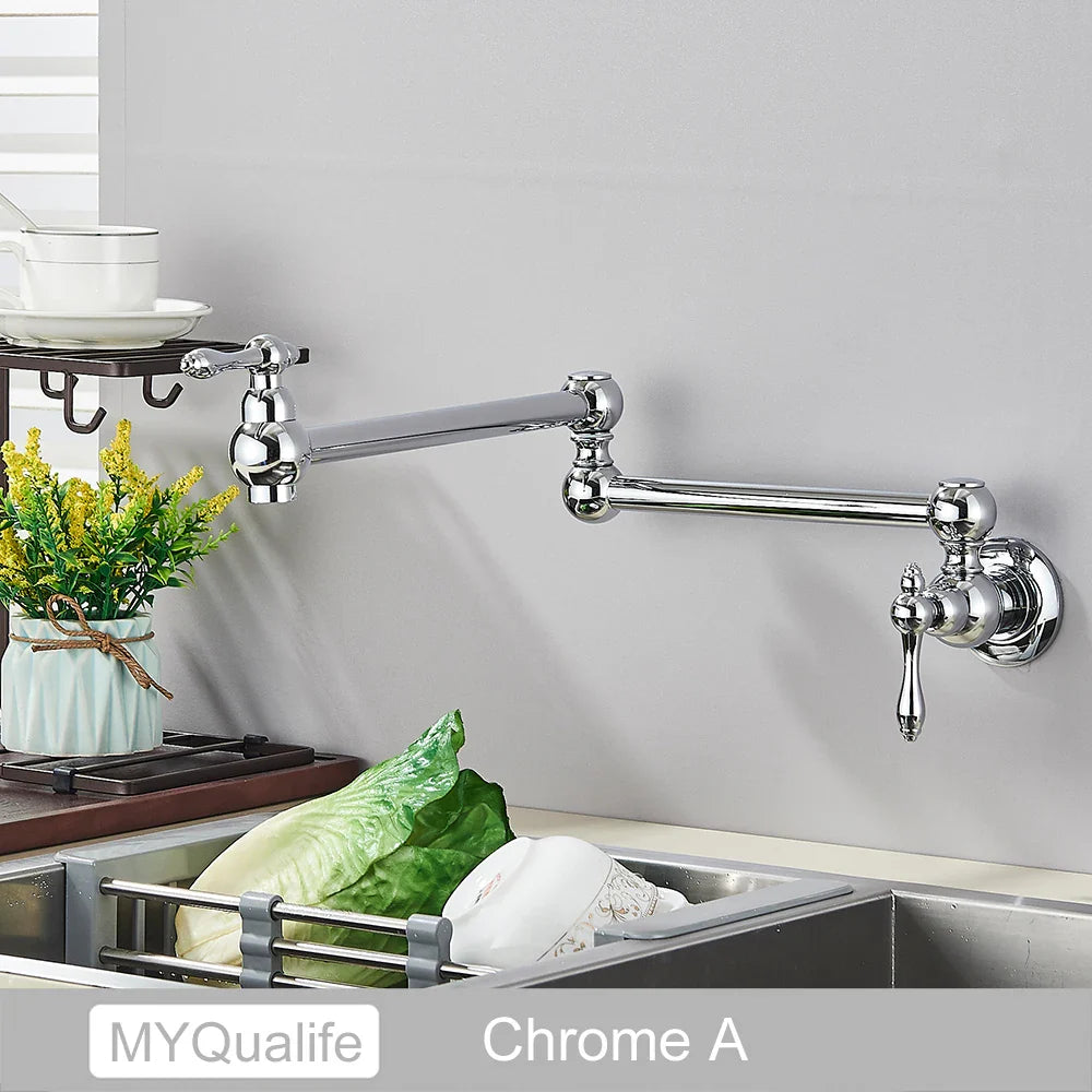 Chrome-finished extendable kitchen faucet with classic design and ornate handles in gold brass pot filler wall mounted style