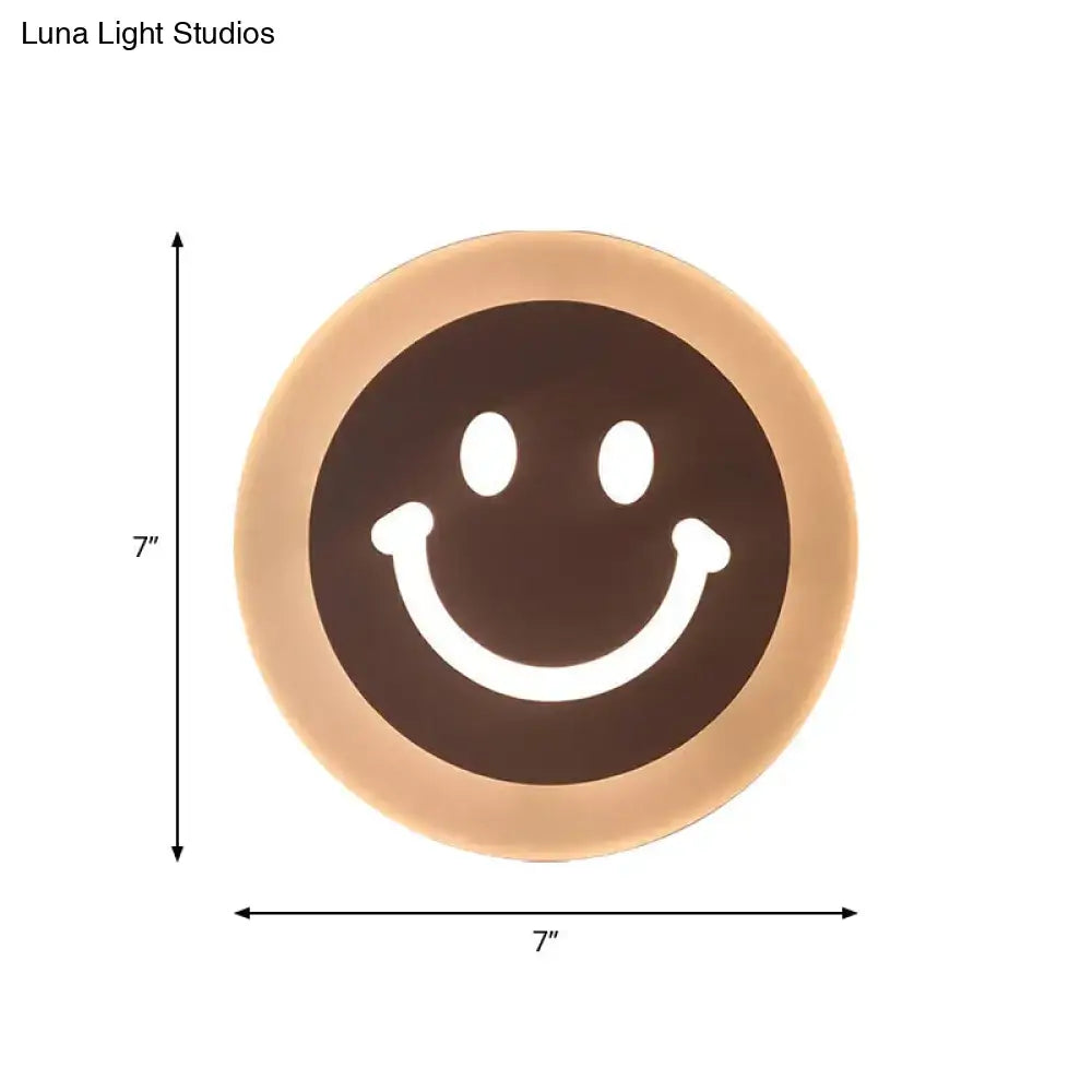 Gold and brown crescent led wall light with smiling face design for children’s bedroom wall light decor