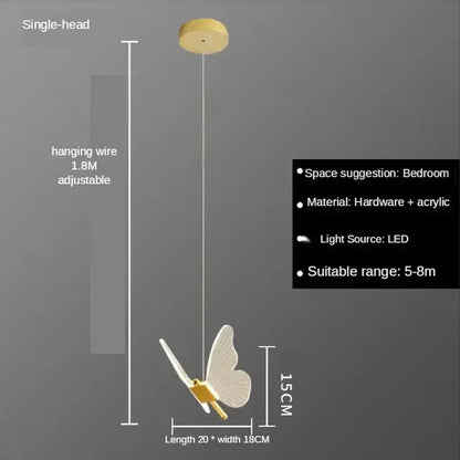 Gold butterfly acrylic chandelier pendant lamp with delicate translucent wings and gold-toned body for bedroom lighting