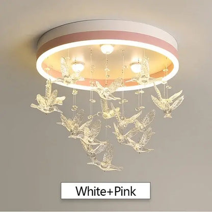 A modern white and pink ceiling chandelier featuring clear crystal bird ornaments by decorbites crystal led for kids bedroom