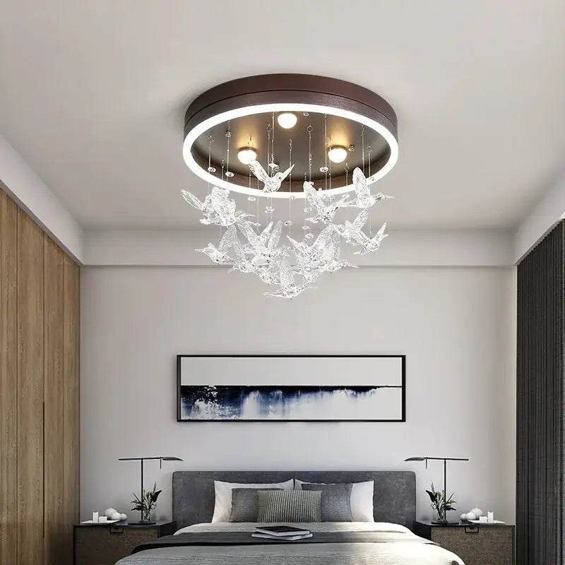 Gold butterfly crystal led ceiling lamp with dark brown frame, glowing white led ring, and clear crystal bird decorbites crystal led