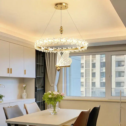 Gold butterfly crystal led chandelier with circular frame and clear crystal droplets for elegant decorbites crystal led decor