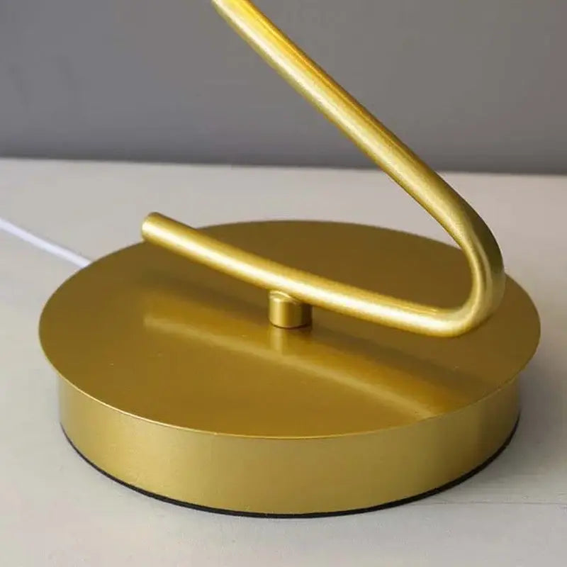 Gold butterfly led table lamp with gold-finished metal curved design and circular base for bedroom decorbites butterfly led decor