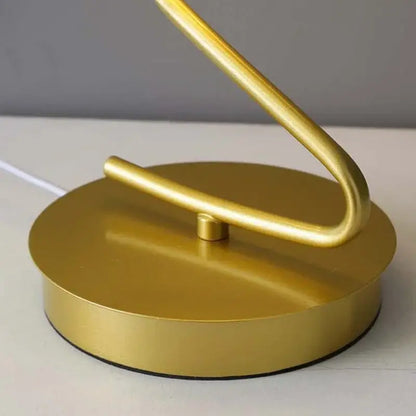 Gold butterfly led table lamp with gold-finished metal curved design and circular base for bedroom decorbites butterfly led decor