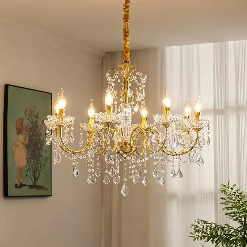 Gold candle style crystal chandeliers light with intricate crystal droplets by decorbites for dining room decor