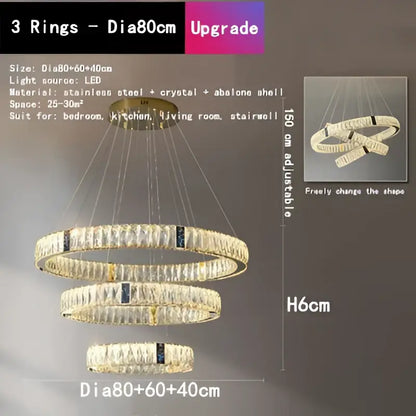 A modern gold decorbites crystal led chandelier with stainless steel frame and crystal accents for dining rooms