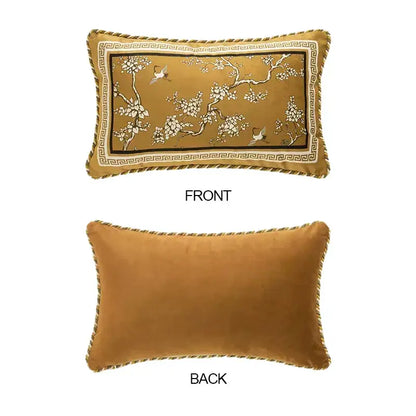 Rectangular gold velvet lumbar pillow case with white blossoms and crane birds branches on mustard background