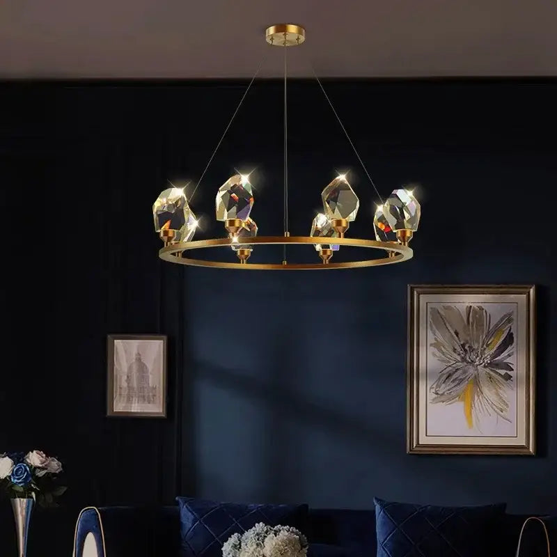 Gold-toned dining room chandelier pendant light with faceted crystal-like pendants by decorbites dining room