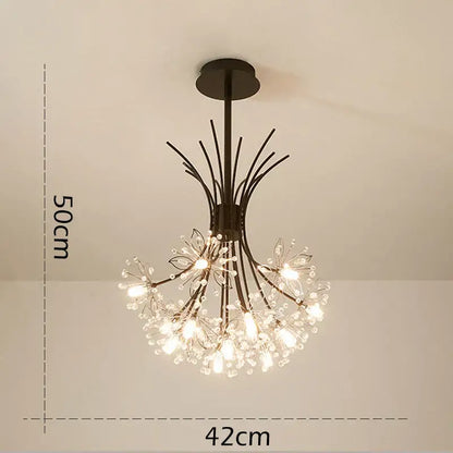 Black metal flower pendant chandelier with clear crystal bulbs emitting warm light decorbites crystal flower design