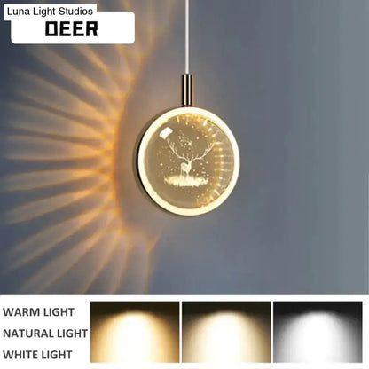 Decorbites clara led crystal glass pendant light with gold frame and illuminated deer casting warm radiant rays