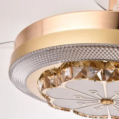 A modern gold ceiling fan with crystal invisible fan accents and a white petal-shaped light diffuser for living room decorbites crystal invisible