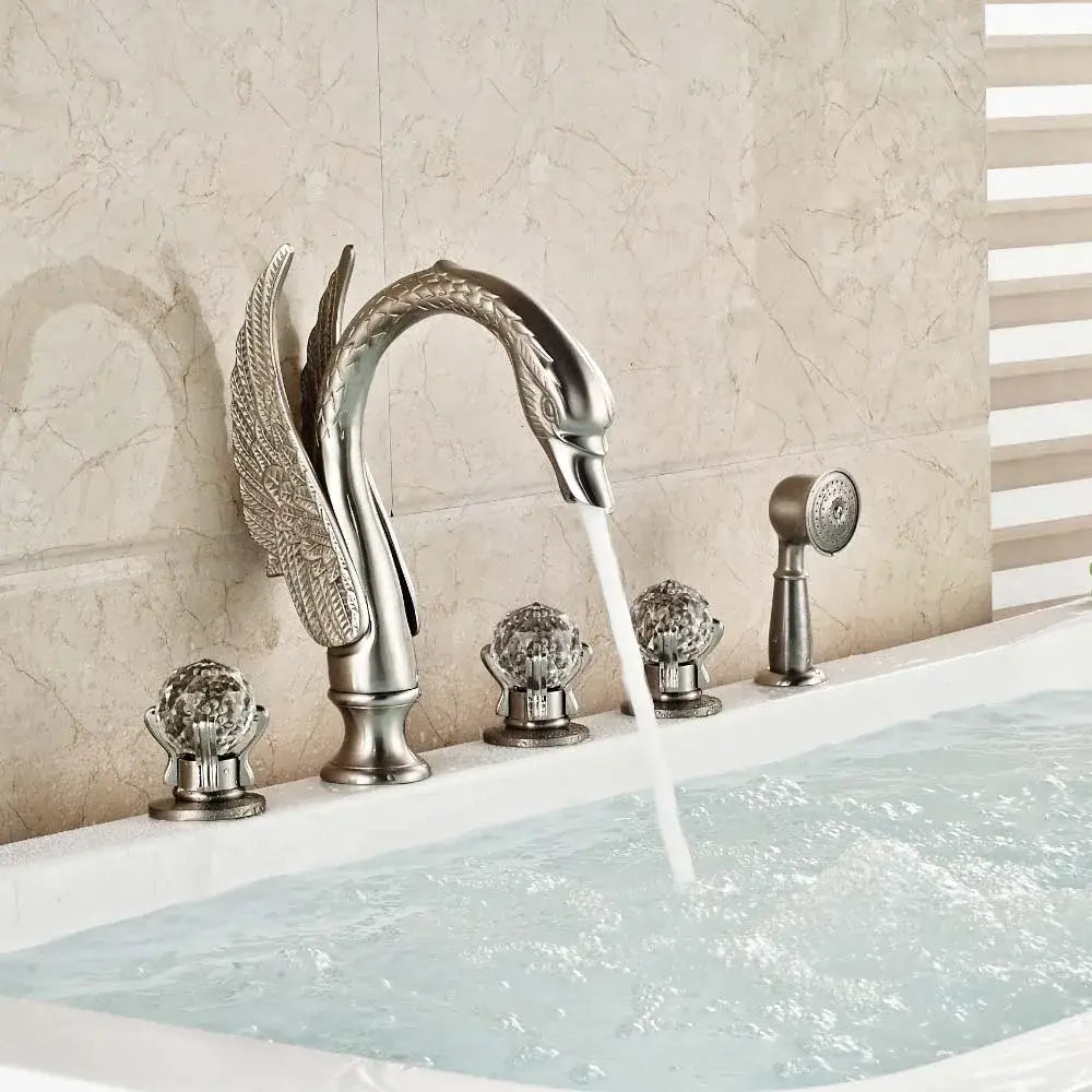 Gold crystal knob swan faucet with ornate silver swan-shaped design and decorbites crystal knob for bathroom tub mixer use