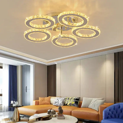Gold-toned decorbites crystal led ring chandelier with five illuminated circular tiers for dining room decor