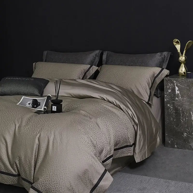 Luxurious taupe satin bedding set with subtle leopard print and black piping made from decorbites 100s egyptian cotton