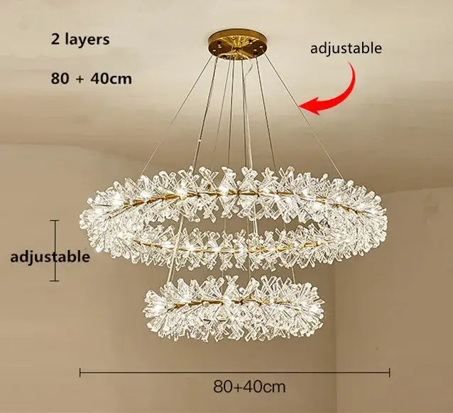 Gold double tiered crystal flower chandelier dining room light with gold metal frame and adjustable hanging chains from decorbites crystal flower