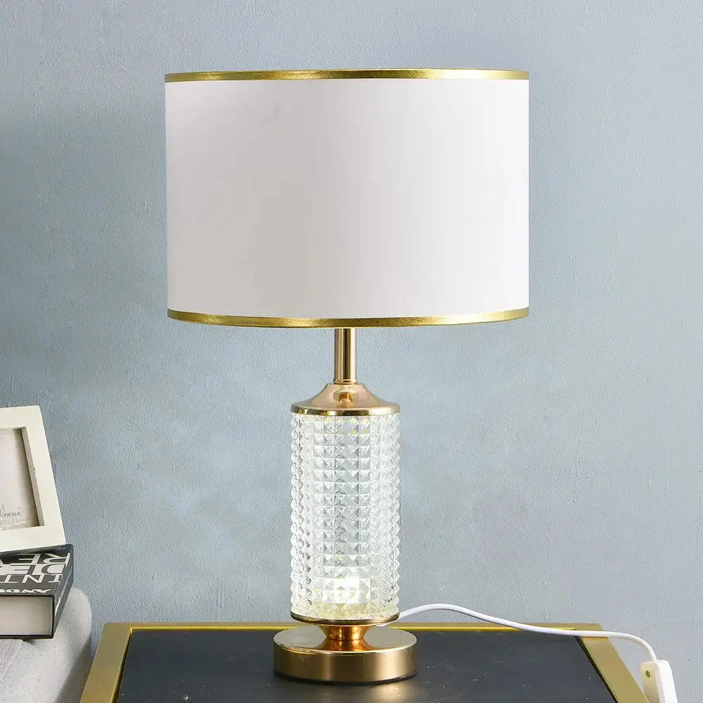 Gold faceted clear crystal glass table lamp with white fabric shade and brass trim for bedroom decorbites clear crystal
