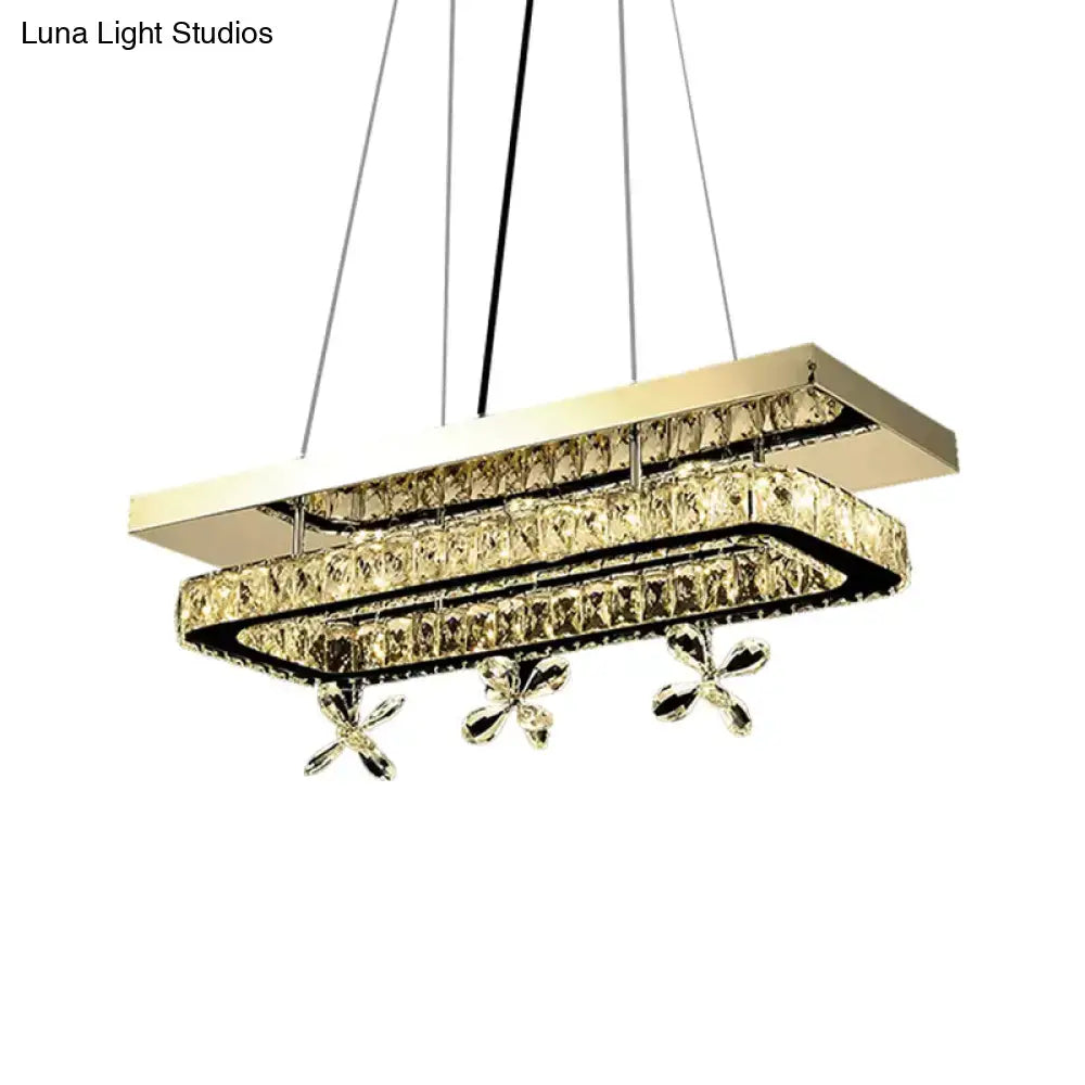 Gold-toned DecorBites rectangle ring LED island light with layered crystal accents and flower deco star-shaped ornaments