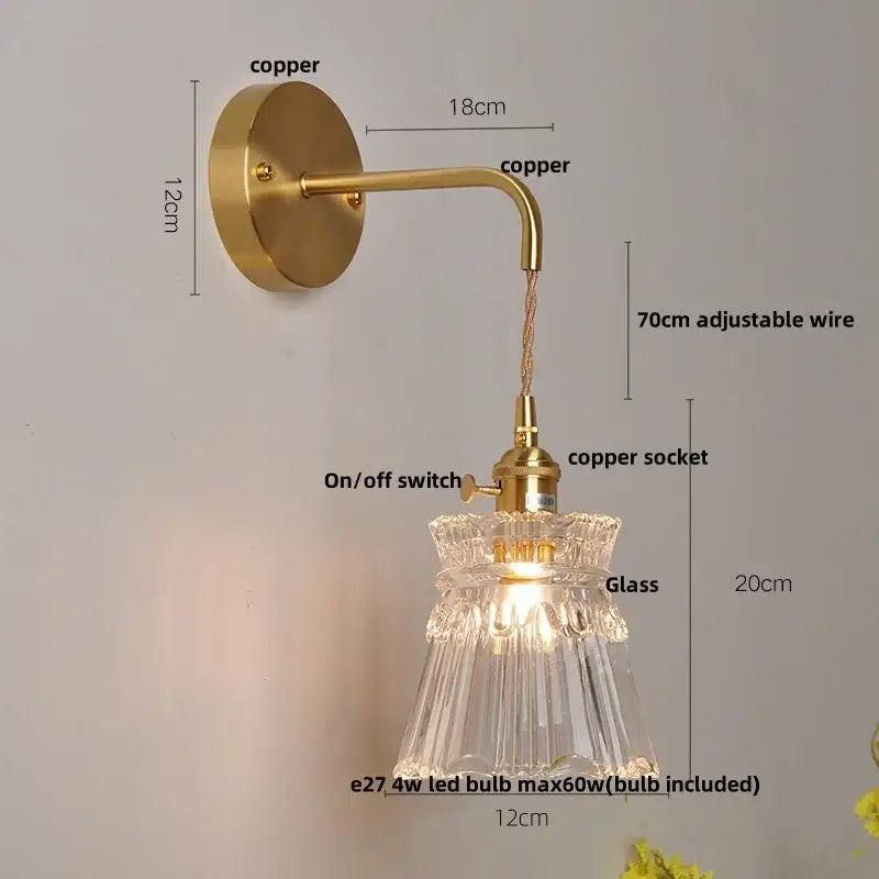 A vintage brass copper wall light with ornate clear glass led shade and adjustable wire for bedroom decorbites clear glass lighting