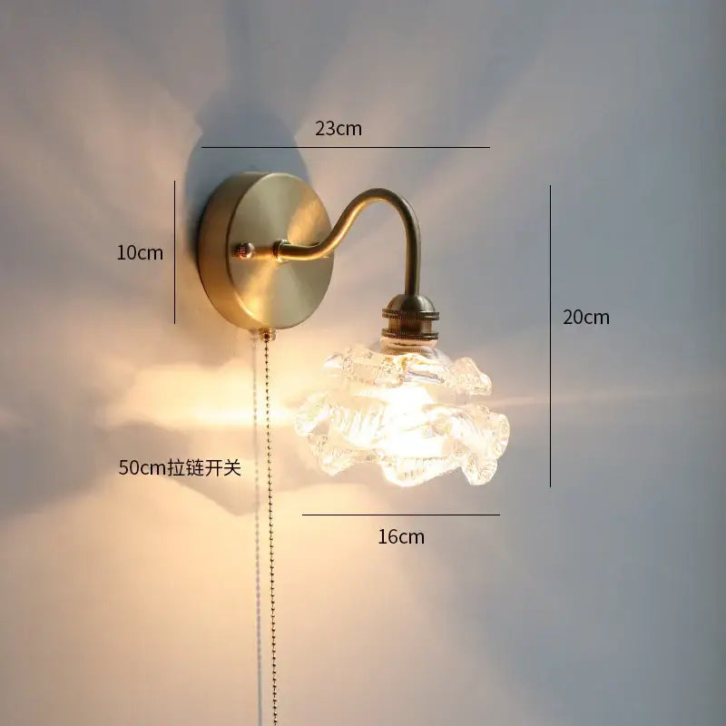 Brass-finished gold fluted glass wall sconce with clear textured shade and 50cm pull-chain switch for bedroom decorbites copper wall lamp