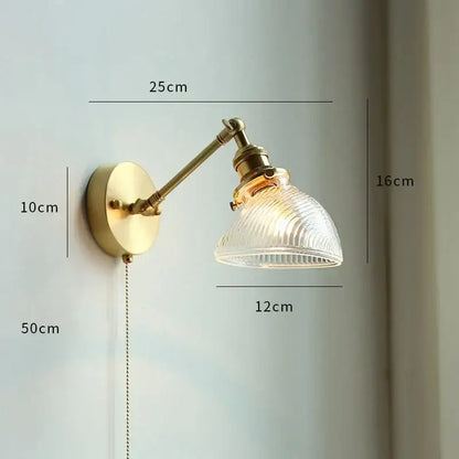 Vintage-style brass wall sconce with gold fluted glass shade ideal as a bedroom wall lamp and decorbites copper wall decor
