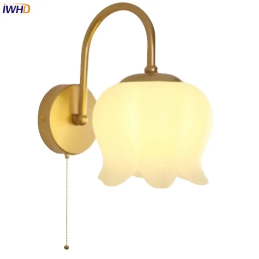 Gold iron led wall sconce with pull chain featuring a frosted glass bell-shaped shade and arched metal arm for hallway decorbites iron led