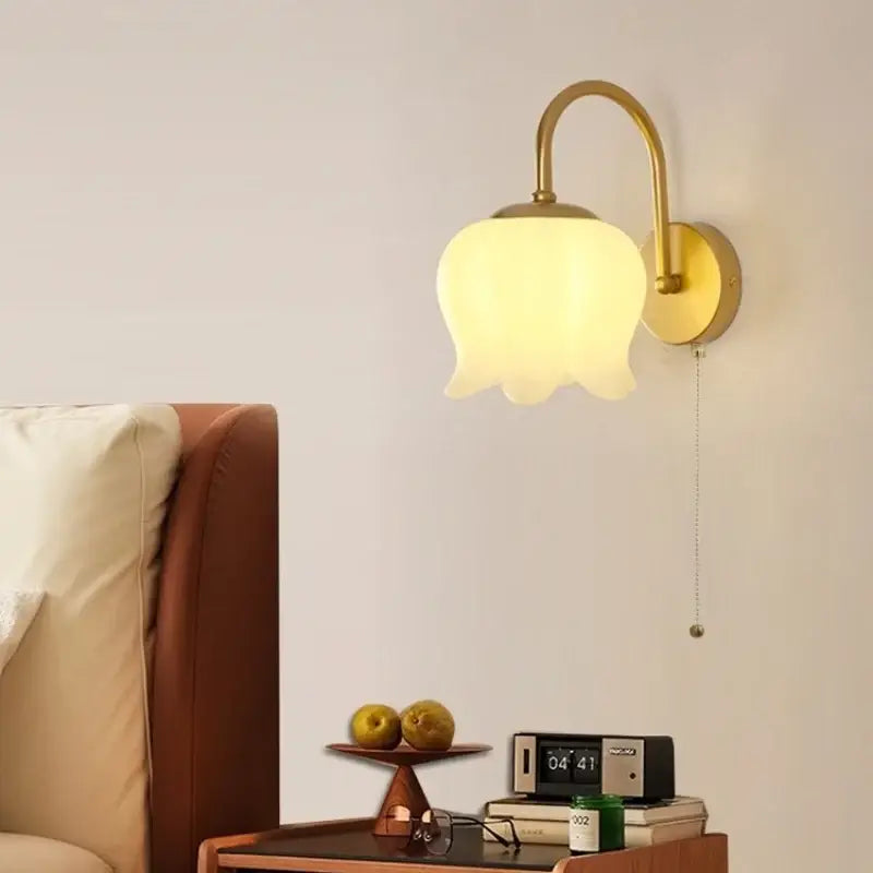Gold iron led wall sconce with frosted glass tulip shade and pull chain for hallway decorbites iron led wall lighting