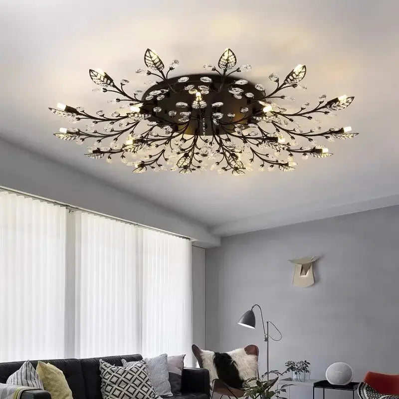 Black wrought iron decorbites crystal ceiling chandelier with gold leaf design and crystal accents for living room